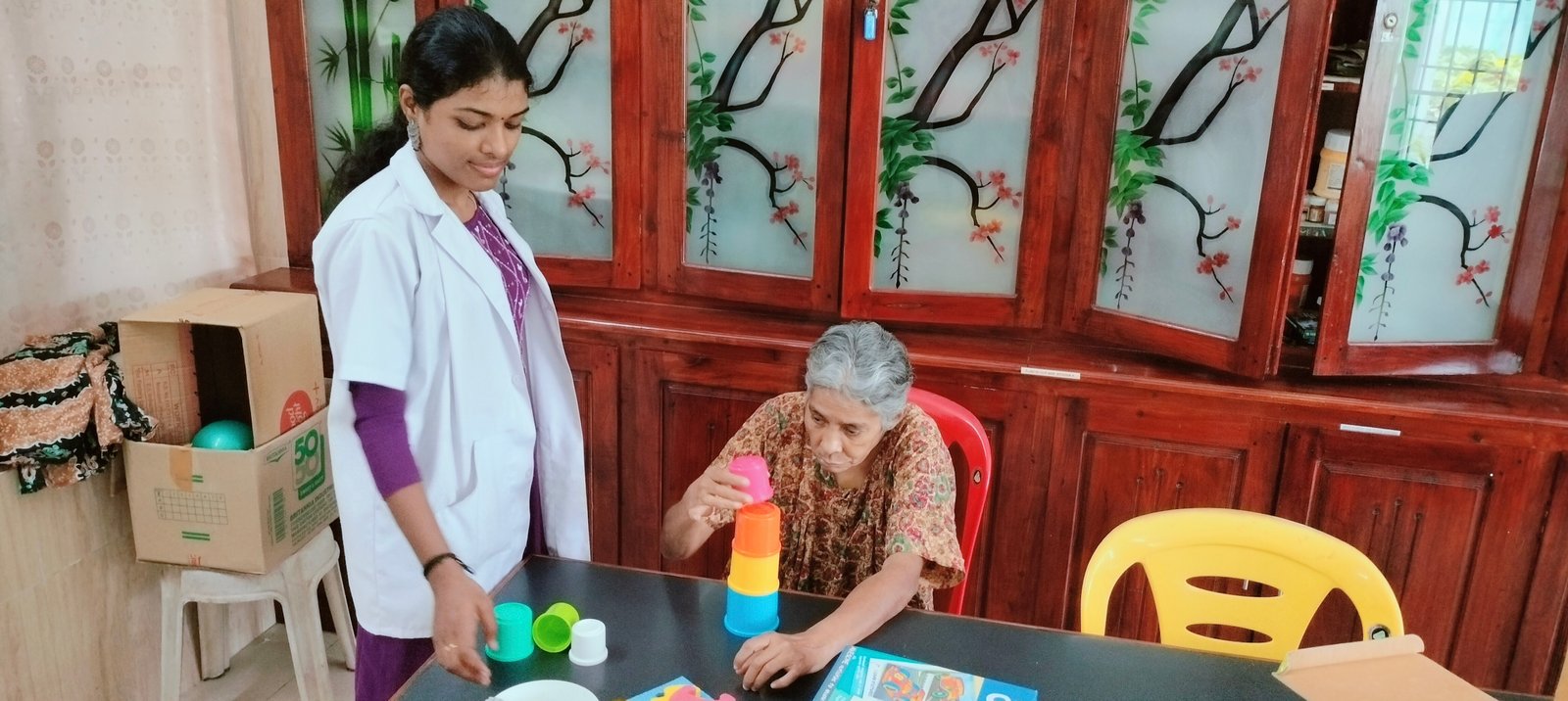 A woman playing indoor games, showing rehabilitation